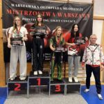 zawodniczki sztuk walki na podium